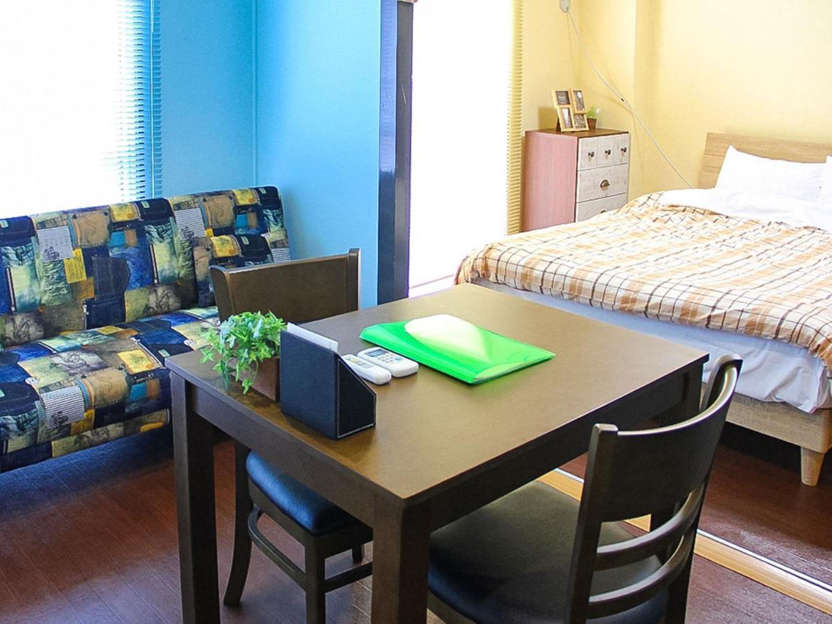 Calm house Beppukitahama Apartment Bagian luar foto